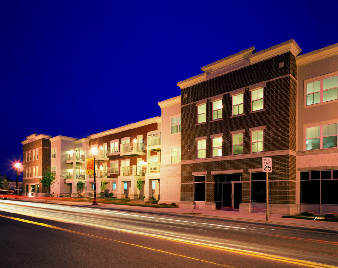 https://4lakesproperties.com/sites/4lakesproperties.com/assets/images/Deforest_Town_Square/DeForest-night-R.jpg